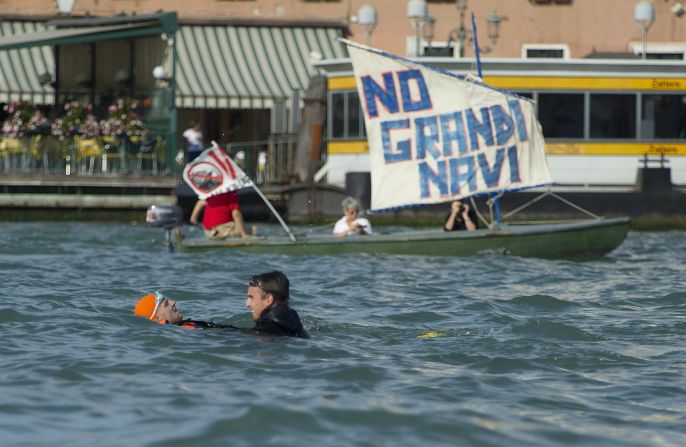 "No Grand Navi" is the slogan used by the protestors which means "No big ships."