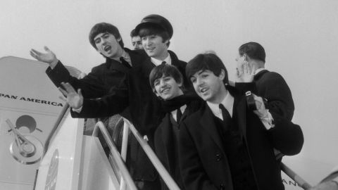 The Beatles prepare to leave for America in early 1964.