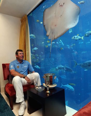 Westwood comes face-to-face with his new fishy friends in the underwater suite. No doubt there will be a pack of sharks circling to take the title off the 40-year-old in next year's competition.
