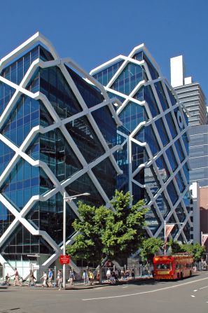 Architect: Fitzpatrick + Partners.<br />Macquarie Bank is headquartered in Sydney, and is Australia's only major bank.<br />A particularly eye-catching aspect of Macquarie Bank Centre is the white lattice structure that sits like a net around the glass cube. A total of 1,000 tonnes of steel girder were used in construction of the building. 