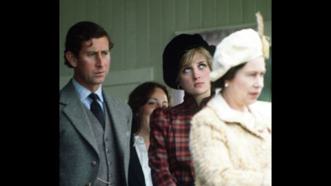 The prince and Princess Diana are seen behind the Queen during the Braemar Highland Games in Scotland in September 1981. 