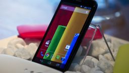 Google, Android. The new low cost smartphone of Motorola, "Motorola Moto G", is displayed in Sao Paulo, Brazil on November 13, 2013. The smartphone, with dimensions 65.9mm W x 129.9mm H x 6.0 - 11.6mm D is equipped with a Qualcomm Snapdragon 400 with quad-core 1,2 GHz CPU, a 4.5-inch display and Android Operating System 4.3 and a suggested price of $ 179 USD. AFP PHOTO / NELSON ALMEIDANELSON ALMEIDA/AFP/Getty Images