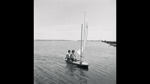 The then-senator engages in his favorite pastime of sailing at Hyannisport, Massachusetts, with Jackie in July 1960. 