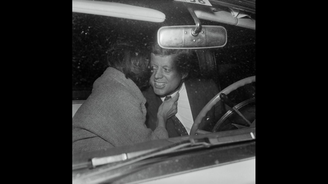 Jacqueline greets her husband in 1960. 