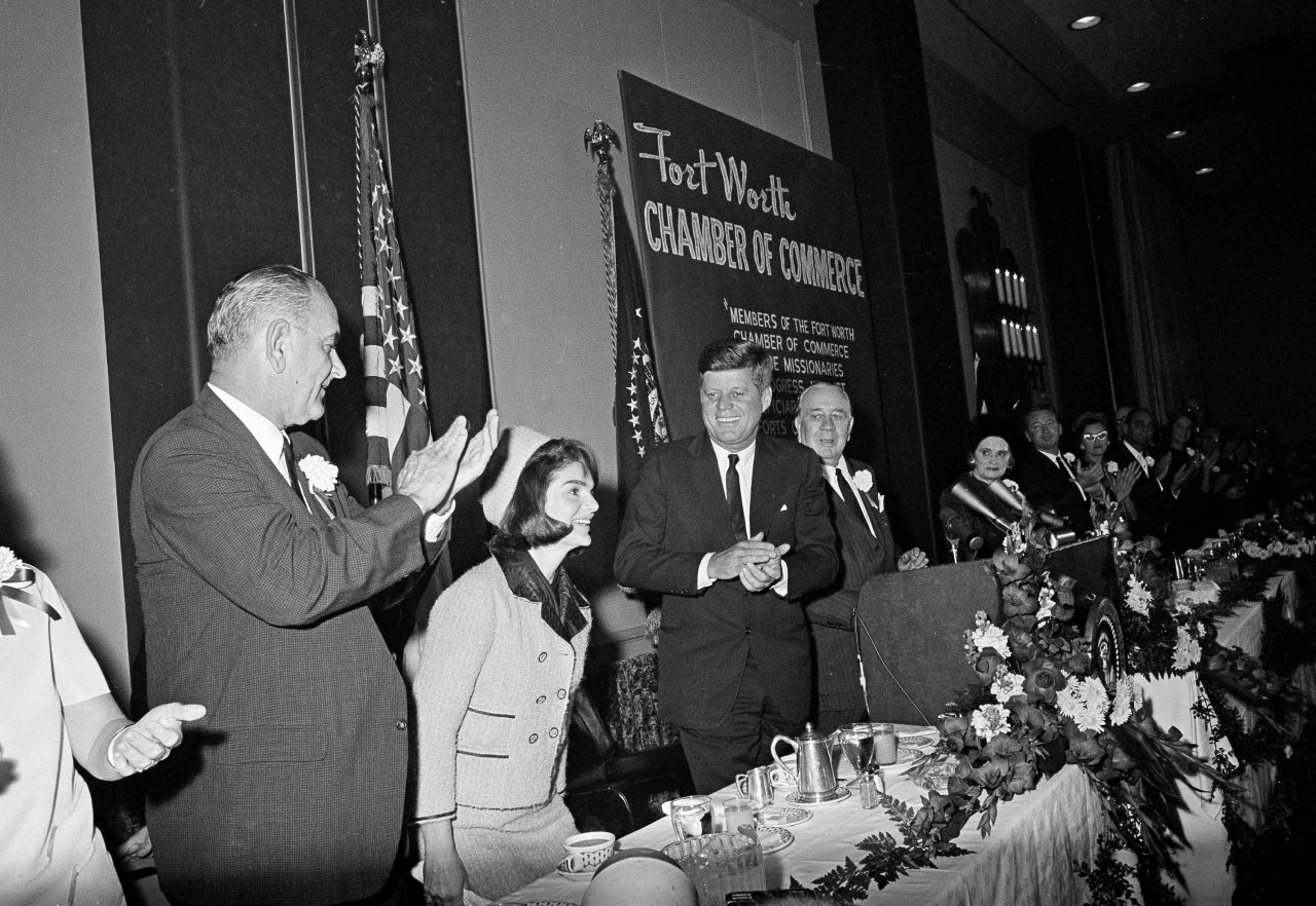 First lady Jacqueline Kennedy at a breakfast held by the Chamber of Commerce in Fort Worth with Vice President Lyndon B. Johnson, left, and Kennedy. 