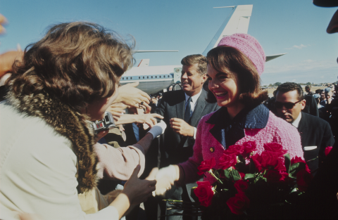 The Kennedys arrive at Love Field in Dallas on a trip to advance the upcoming 1964 campaign. 