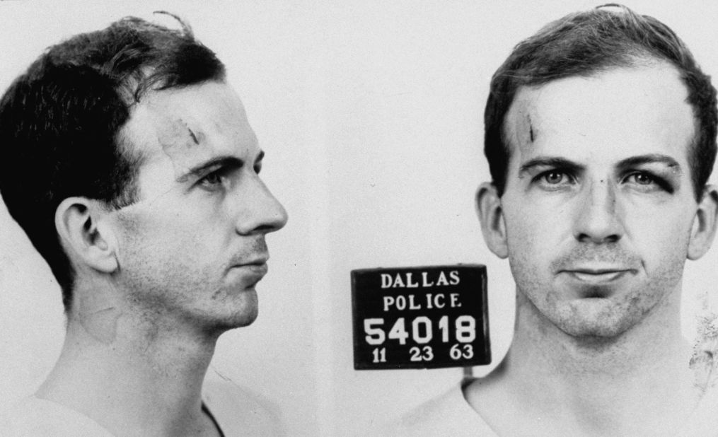 Police mug shot of Lee Harvey Oswald. He is arraigned in the slaying of Officer Tippit on November 22 and/or the murder of the president the next day. As Oswald is being transferred from the Dallas city jail to the county jail, nightclub owner Jack Ruby shoots and kills him, an event captured live on TV. Ruby is arrested immediately.
