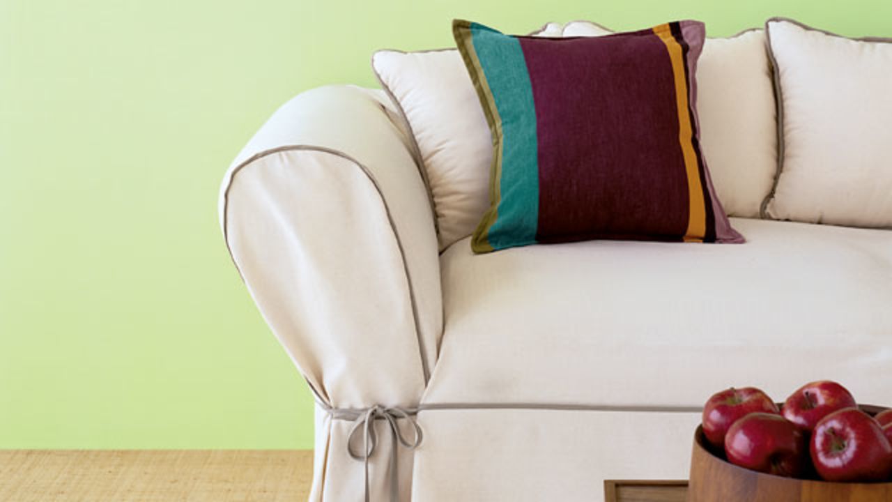 Easy DIY upgrade: Give your sofa a new look. Your favorite sofa is having a midlife crisis: It's not worth reupholstering, but it's not ready for the junkyard, either. A pre-made slipcover is just the thing to see it through. For a tight fit, use a wooden spoon or a spatula to work the fabric deep into the couch's crevices. If the arms of a chair or sofa are too narrow, beef them up with foam quilting or comforter batting (available at most fabric stores). To keep a slipcover from sliding out of place on a leather couch, lay nonslip carpet padding on the seat cushions.
