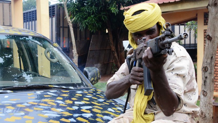 A Seleka fighter poses holding his weapon on July 25, 2013 at the Bangui firefighters barracks, turned into a Seleka base.