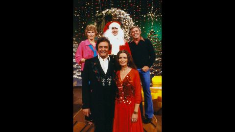 Anne Murray, clockwise from upper left, Kaufman as Santa, Tom T. Hall, June Carter Cash and Johnny Cash appear on the "Johnny Cash Christmas Special" on CBS in 1979. 