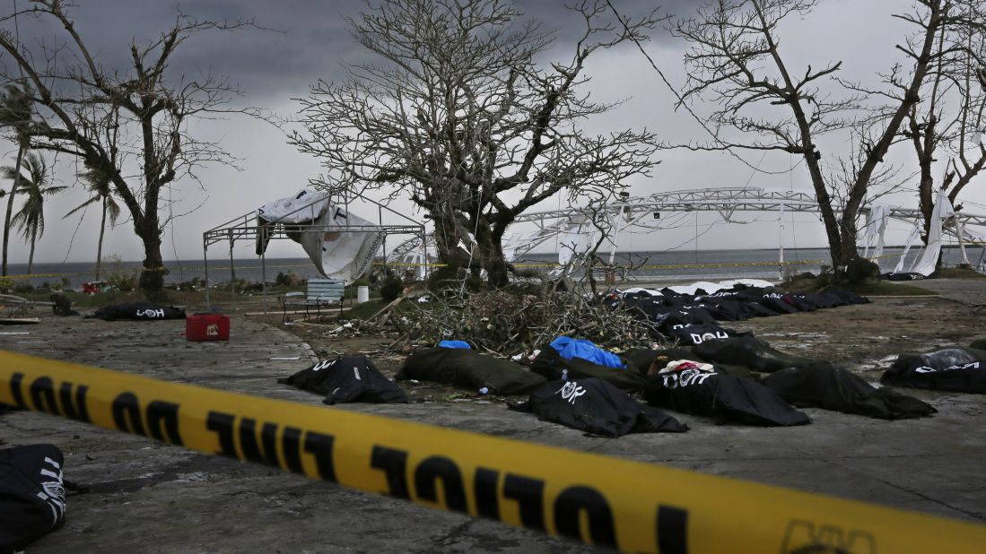 Dozens of bodies are placed near Tacloban City Hall on November 14 as workers prepare a mass grave on the outskirts of the hard-hit city.