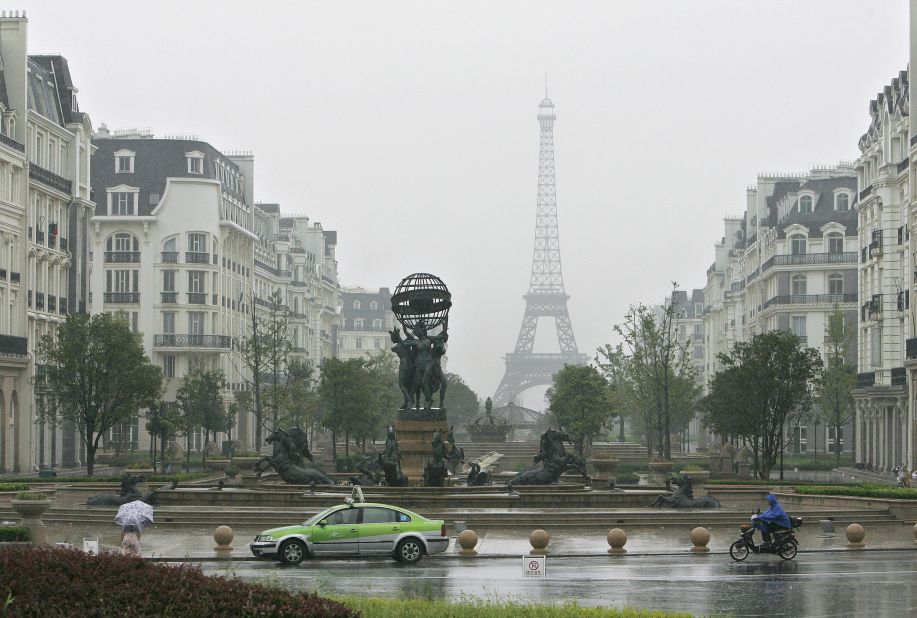 There's another Eiffel Tower, looking slightly melancholic in the gray gloom, in the eastern Chinese city of Hangzhou. 