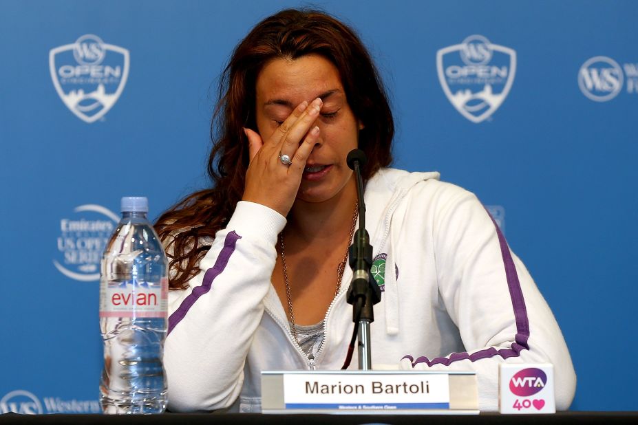 Six weeks after her Wimbledon triumph she lost her opening match at the Cincinnati Open on August 14 and shortly after quit tennis due to injuries. "My shoulder was on fire, my back," she said. "I remember telling myself, 'What are you doing here? What's the point of being in so much pain?'"