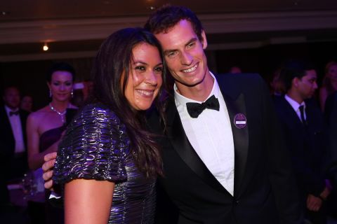 After a BBC presenter made a disparaging remark about Bartoli's appearance, she showed up looking glamorous at the Wimbledon Ball.  "I never dreamed of being a model," she said. "I dreamed about winning Wimbledon." Murray posed for a picture with Bartoli. 