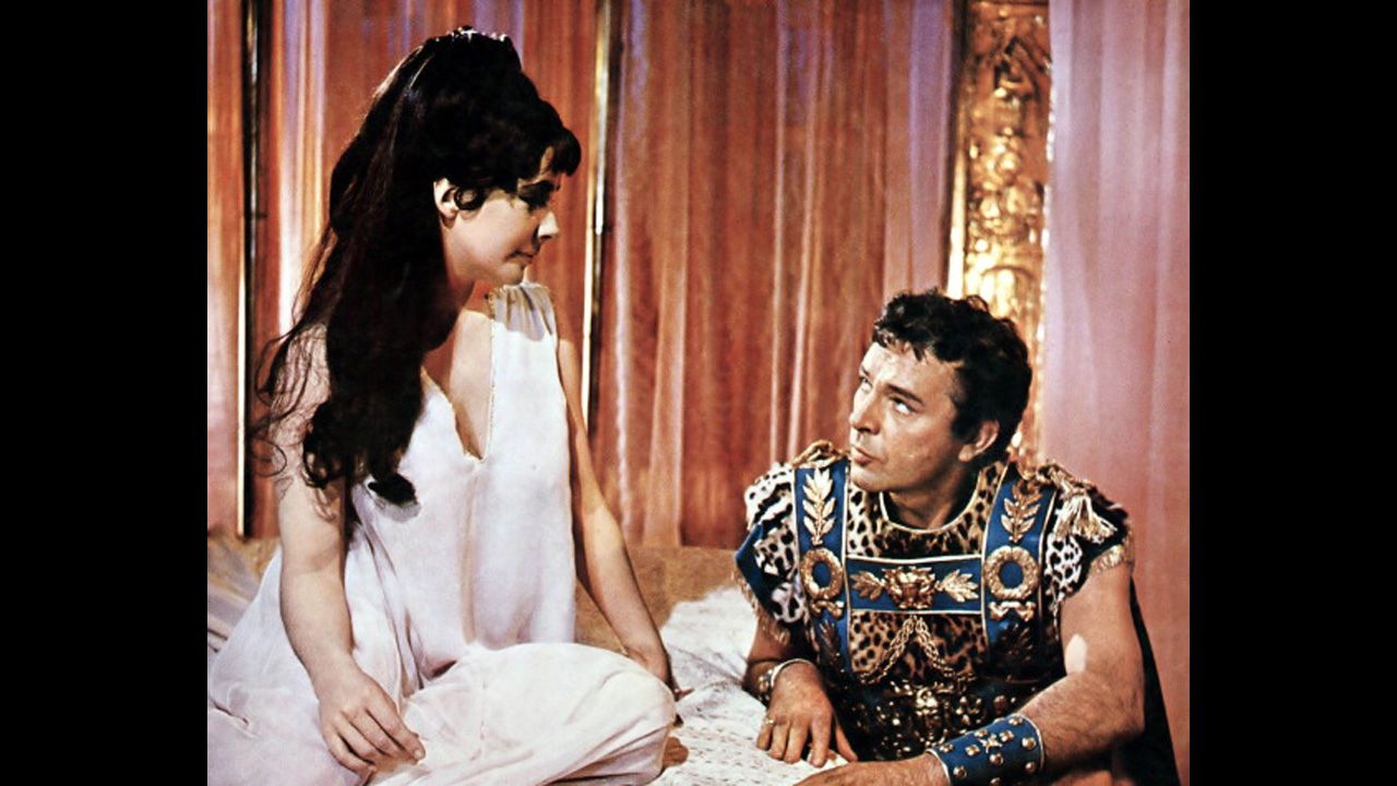 Elizabeth Taylor and Richard Burton appear in a publicity still for the film "Cleopatra," which premiered on June 12, 1963. The historical drama, directed by Joseph L. Mankiewicz, starred Taylor as Cleopatra, and Burton as Mark Antony. 