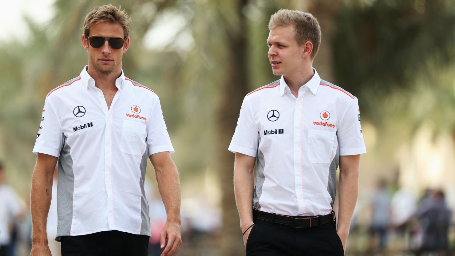 Kevin Magnussen (right) and Jenson Button (left) will be teammates in Formula One next season.