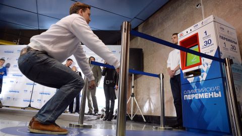 At a Moscow subway stop, riders can perform 30 squats for a free ride.