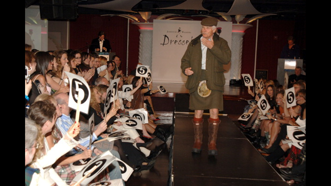 Turner walks the runway during the Dressed to Kilt charity event in 2005.