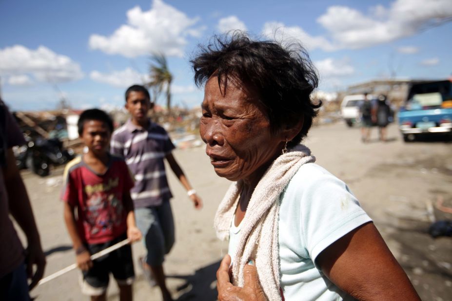 A survivor reacts to the damage at a residential area in Tacloban on November 15.