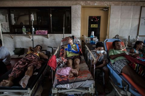 Typhoon victims are treated in the lobby of a Tacloban hospital on November 15.