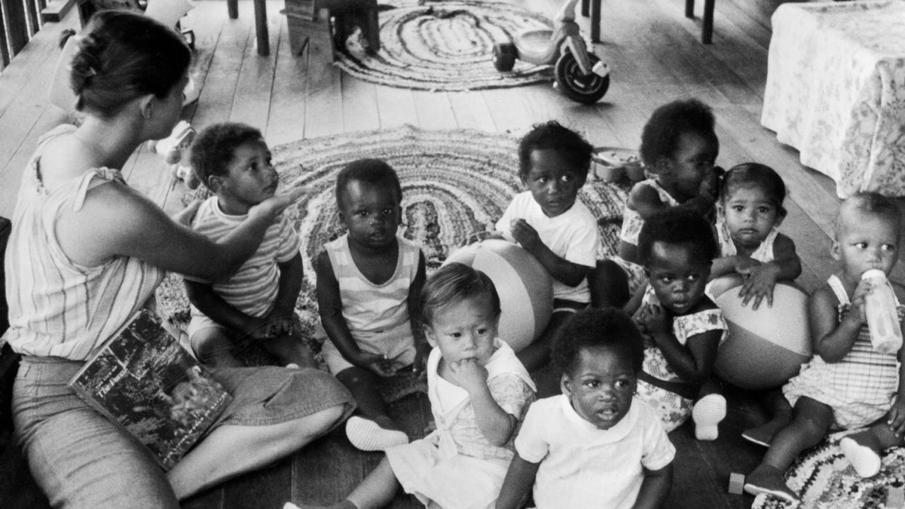 Children of People's Temple members are tended to in the nursery of the sect in 1978, in Georgetown. (It was renamed Jonestown after the sect's leader).