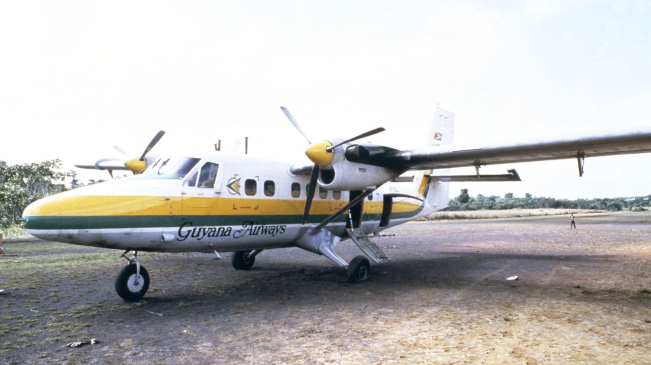 The airplane that carried U.S. Rep. Leo Ryan of California sits on a runway November 18, 1978 in Port Kaituma, Guyana after Ryan was shot and killed by members the cult. Ryan was boarding the plane after paying an investigative visit to the cult's compound. The visit and subsequent assassination precipitated the mass suicide.