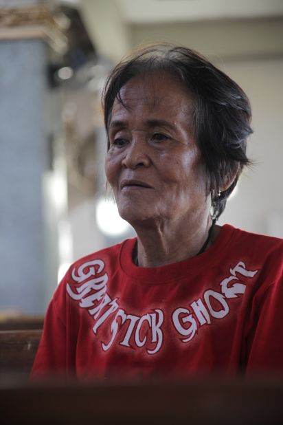 Arsenia Orioque, 74, had come to the church to pray and to take advantage of the medical services being offered there each afternoon. She seldom came to church before the storm struck, but now she says she can find peace there. "In my prayers, I give thanks that I survived the typhoon," she said.<br />
