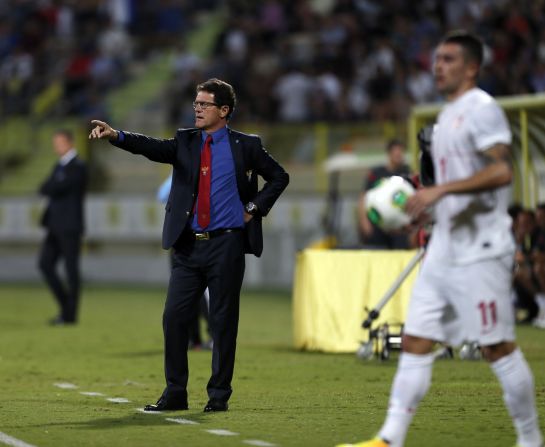 Russia manager Fabio Capello was busy giving orders against Serbia. Russia, which finished ahead of Portugal in qualifying, played to a 1-1 draw in the friendly in the United Arab Emirates. 
