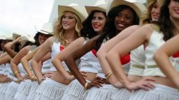 Guard of honor. The Texas grid girls line up with strict precision as they add their own touch of style and glamor to proceedings in Austin.