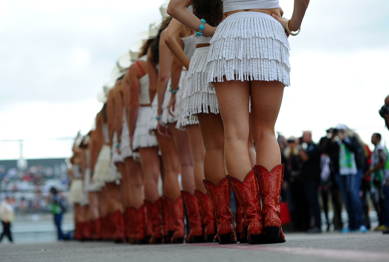 Boot parade. Texan style footware is the order of the day for the grid girls at the F1 Grand Prix in Austin.