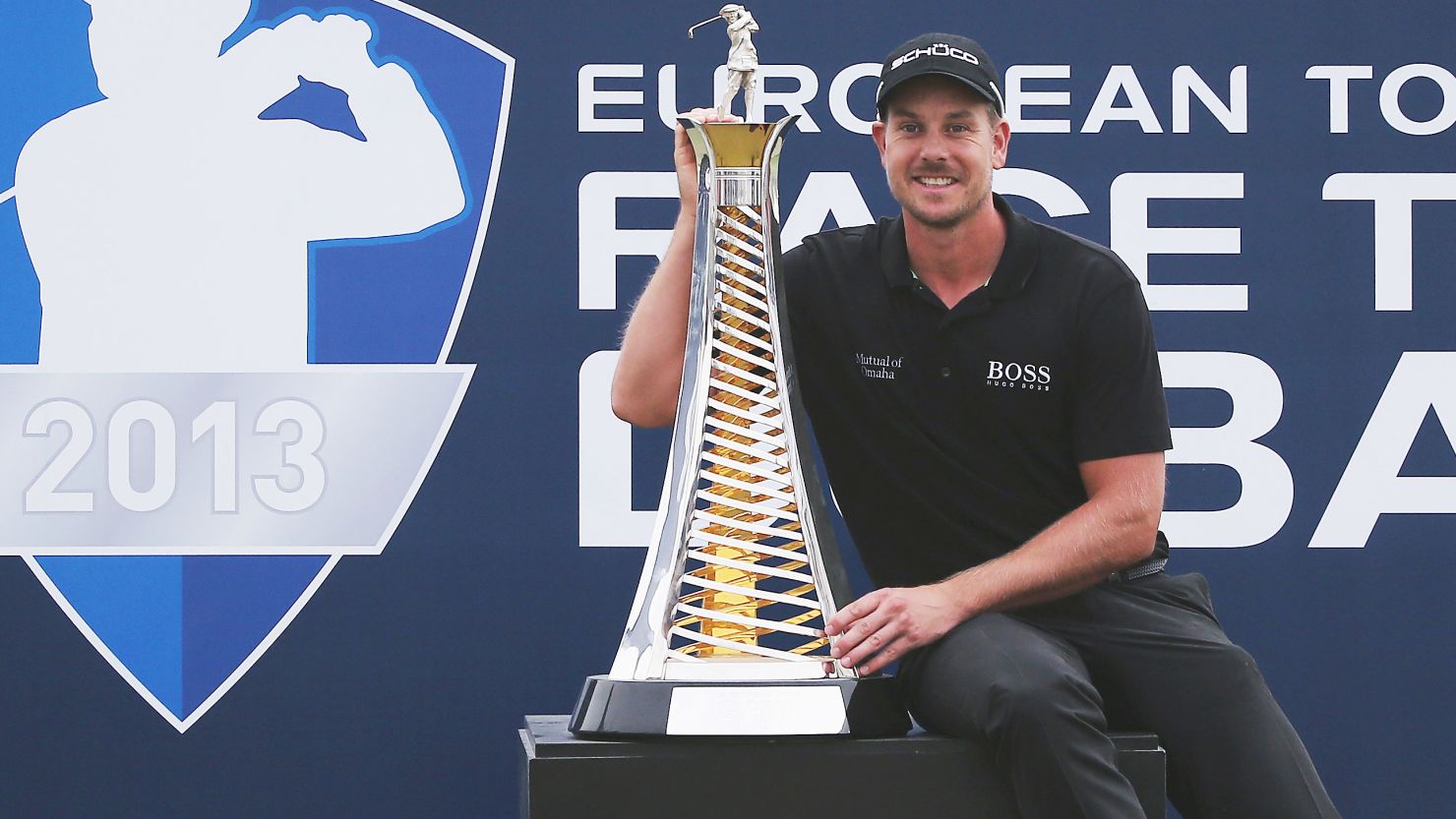 Henrk Stenson with the spoils of his victory at the World Tour championship in Dubai after a stunning last day display, 