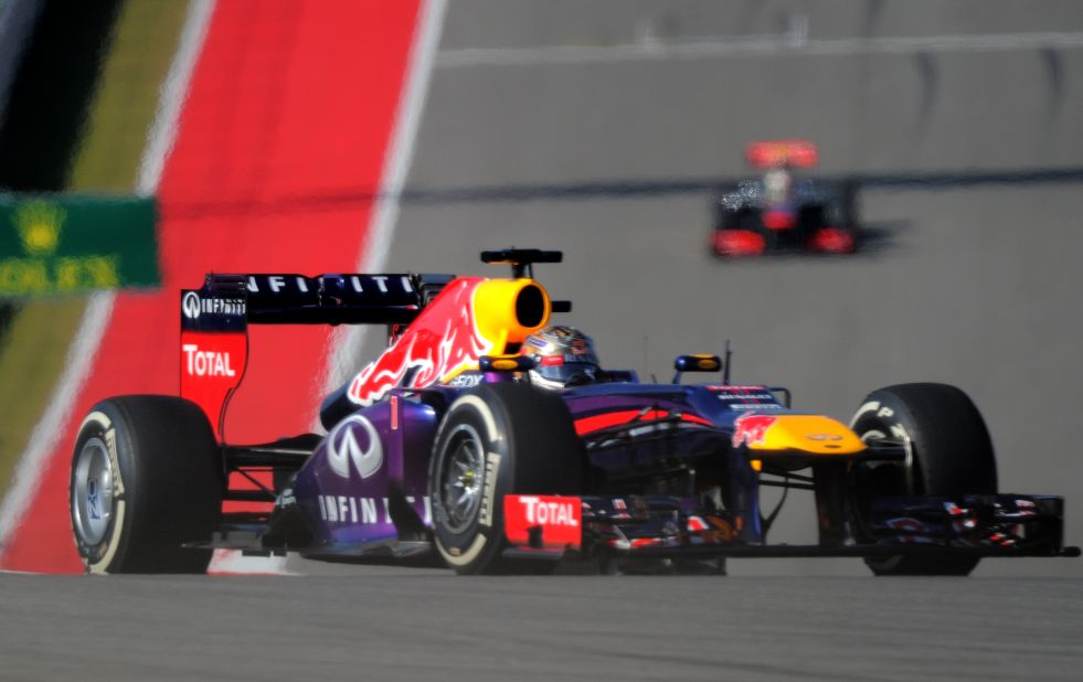 Vettel in splendid isolation in his Red Bull as he takes charge of the United States Grand Prix in Texas.