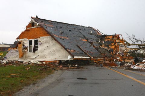 The roof of a building sits in the middle of the road in Kokomo, Indiana, on November 17. 
