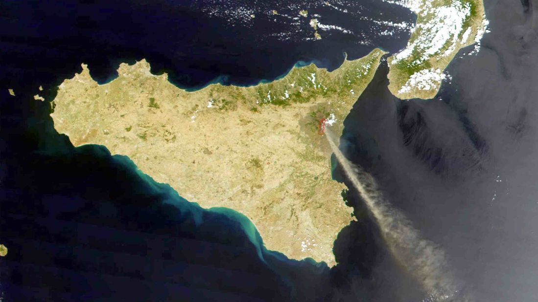 In this photo provided by NASA, Etna is seen from space spewing smoke and ash in 2001.