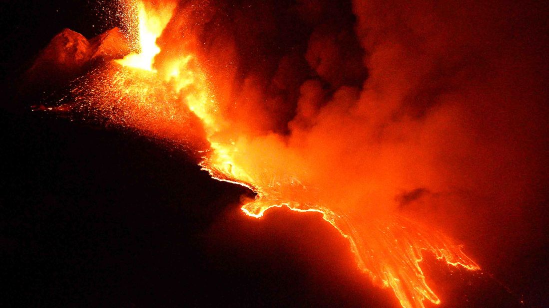 Lava pours down the side of Etna in 2011.