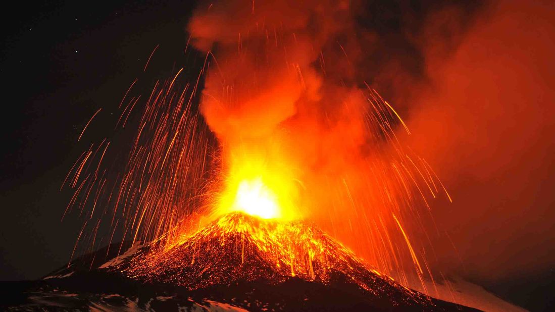 Mount Etna spews lava during an eruption seen from Acireale, Italy, on Saturday, November 16. The volcano, found on the Italian island of Sicily, has been active for about 2.6 million years.