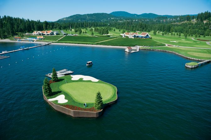 <strong>14th hole at Coeur d'Alene Resort Golf Course, Idaho. </strong>The par-three hole at the Idaho course includes the world's only floating, moveable green, according to the resort. The 15,000-square-foot green in Lake Coeur d'Alene sits on a 104 blocks of expanded polystyrene encased in concrete. The green is tethered using a network of underwater steel cables which can be moved to decrease or extend the length of the hole from 110-210 yards. Players take a "Putter" ferry to the green.       <br />
