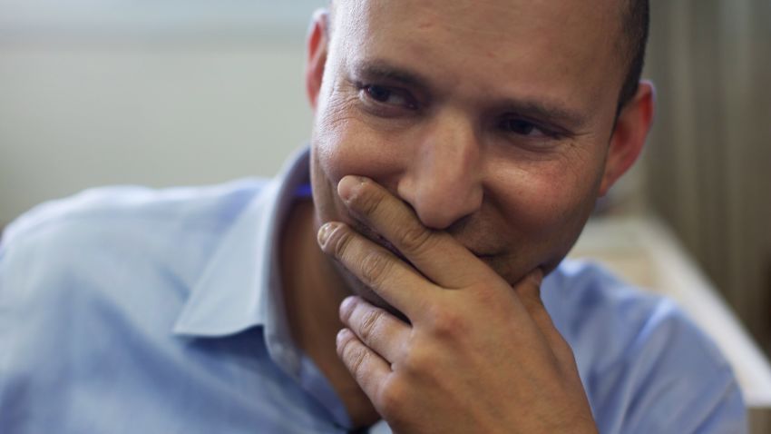 Naftali Bennett, head of HaBayit HaYehudi Party, the Jewish Home party, looks on as he talks to students at a pre-army training school as he campaigns at the Shapira Center on January 20, 2013 near Ashkelon, Israel.