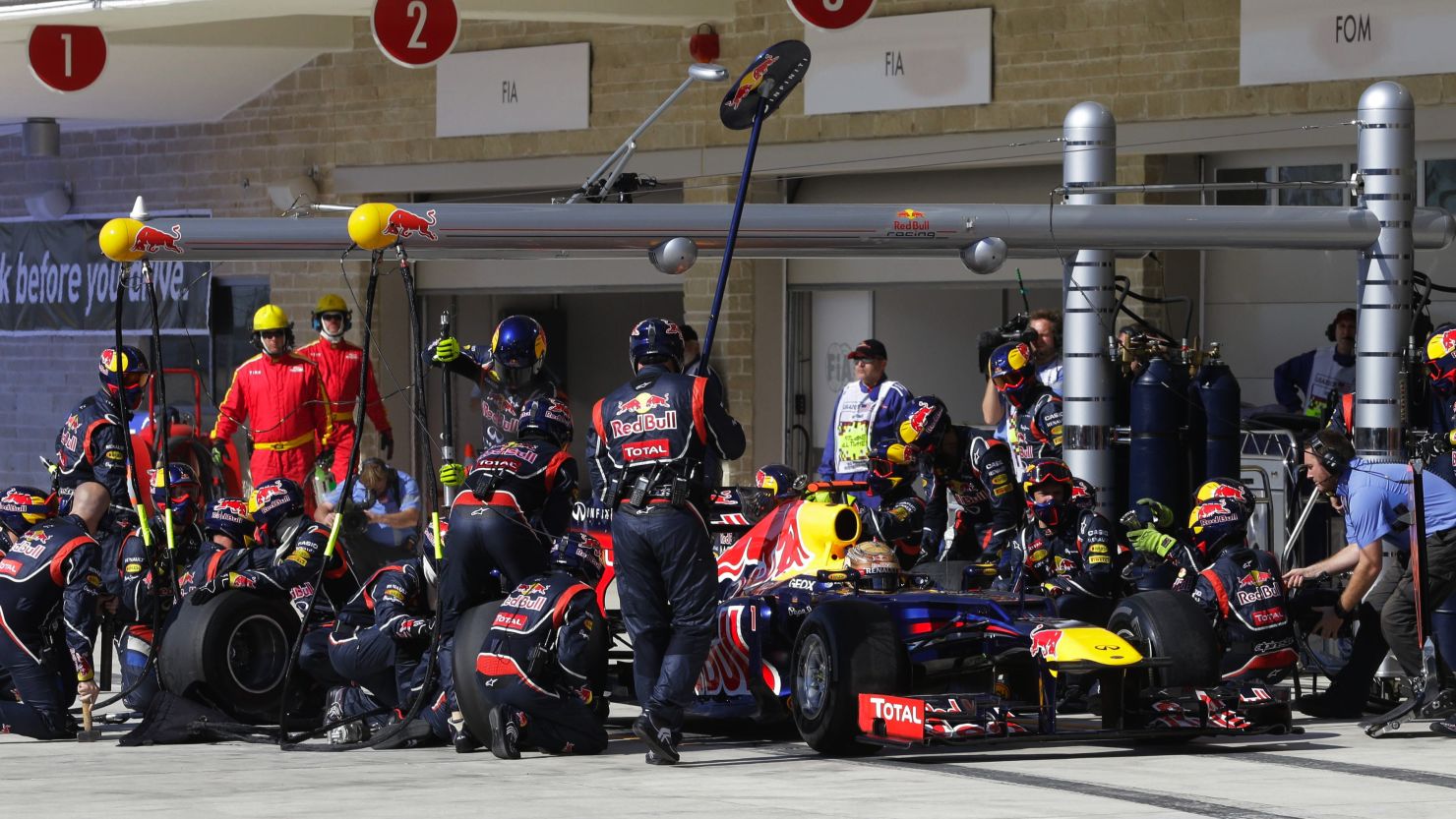 Red Bull's pit crew hard at work during Sunday's U.S. Grand Prix in Austin, Texas on Sunday.   