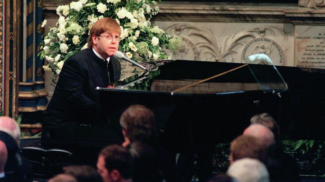 John sings "Candle in the Wind" at Princess Diana's funeral in 1997. The tribute became one of the best-selling singles of all time. Proceeds were donated to charity.