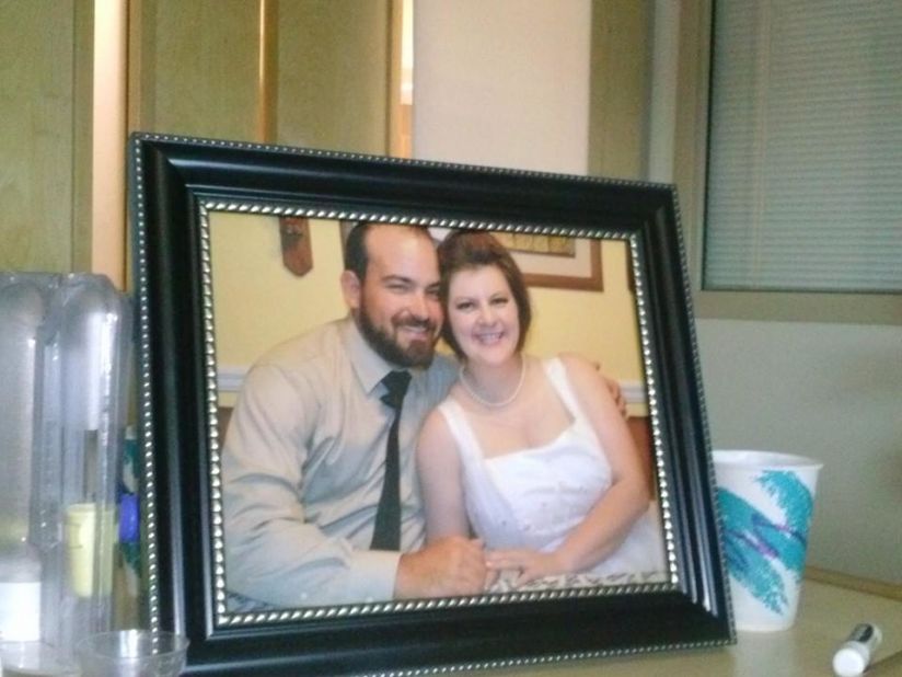 A framed wedding photo sits among the balloons, cards and gifts from friends and loved ones. Bradford says her week with Buck Storey was the happiest of her life. 