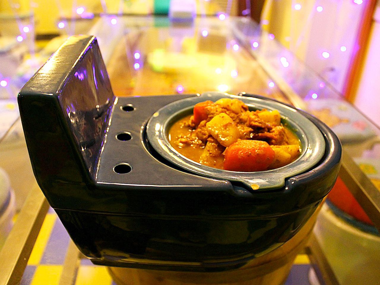At Beijing's toilet-themed restaurant, all 50 seats are made from actual toilet bowls, topped with cartoon-themed warmers. This particular dish? Beef curry in a toilet-shaped bowl. "The food wasn't really that good," says iReporter Alainsojourn. At least he walked away with these photos.<a href="http://travel.cnn.com/gallery-inside-beijings-toilet-restaurant-690726" target="_blank"> Read more: Inside Beijing's toilet restaurant</a>