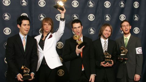 Levine and Maroon 5 pose with their awards for "Best New Artist" during the 2005 Grammy Awards in Los Angeles.
