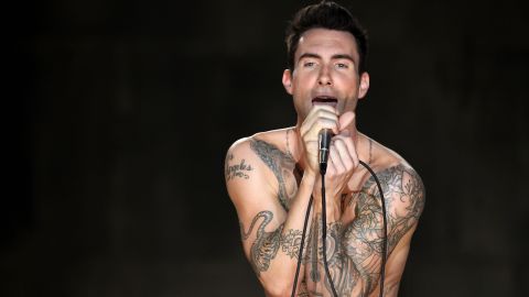 Levine sings during the Maroon 5 video shoot for their song "Moves Like Jagger" in Los Angeles in 2011.