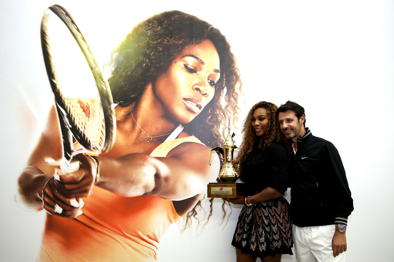 Serena Williams poses with her coach Patrick Mouratoglou after reclaiming the year-end world No. 1 ranking she last held in 2009. 