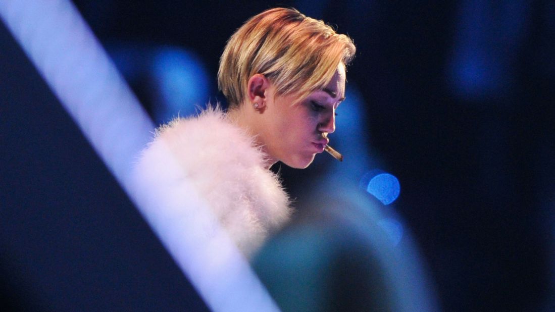 Cyrus smokes a marijuana joint onstage during the MTV Europe Music Awards in Amsterdam, Netherlands, on November 10.