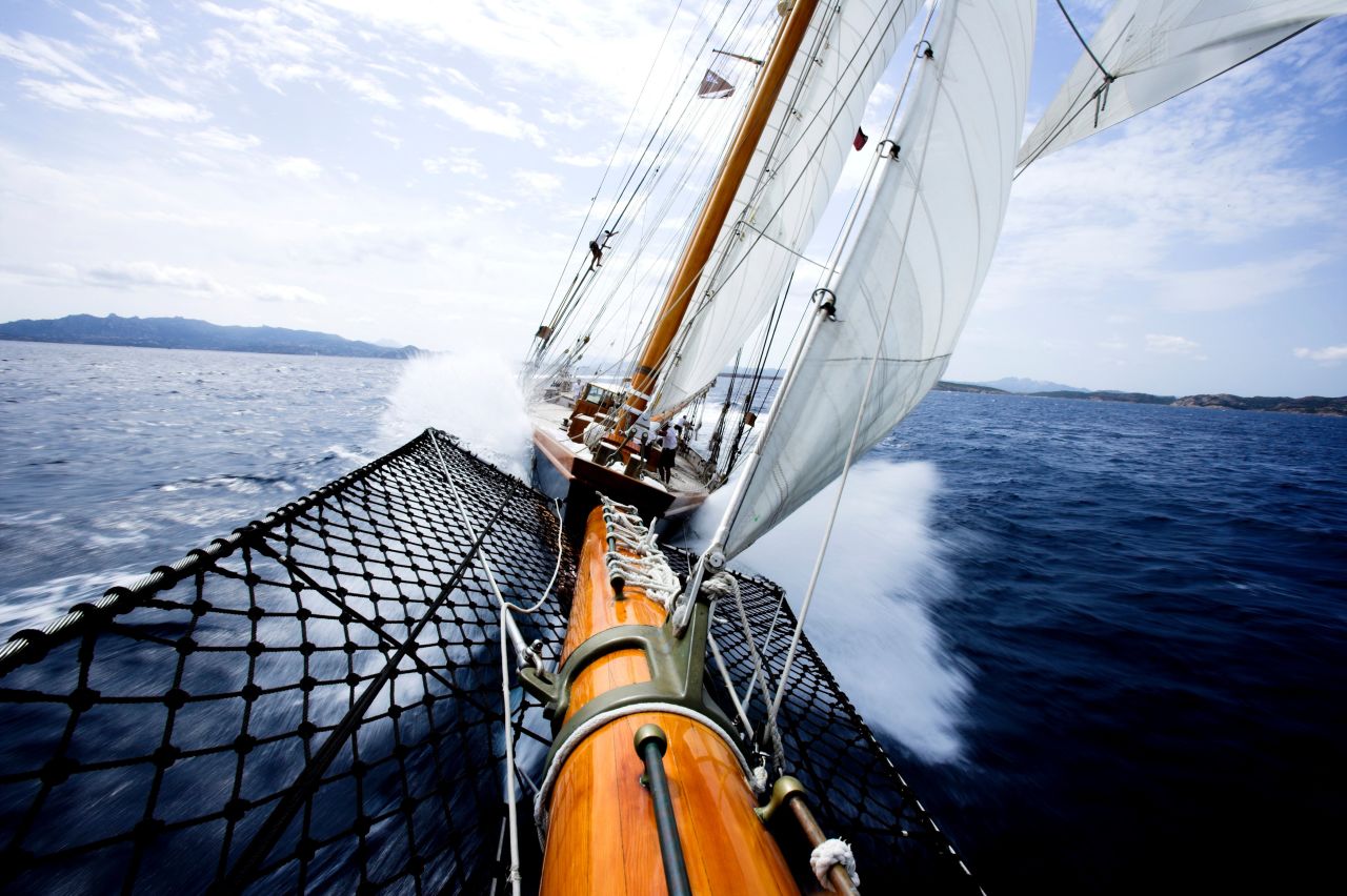 Out on the bowsprit of the schooner Shenandoah, Onne puts his camera in hand and his heart in his throat to capture the beauty of this yacht sailing off the coast of Sardinia. 