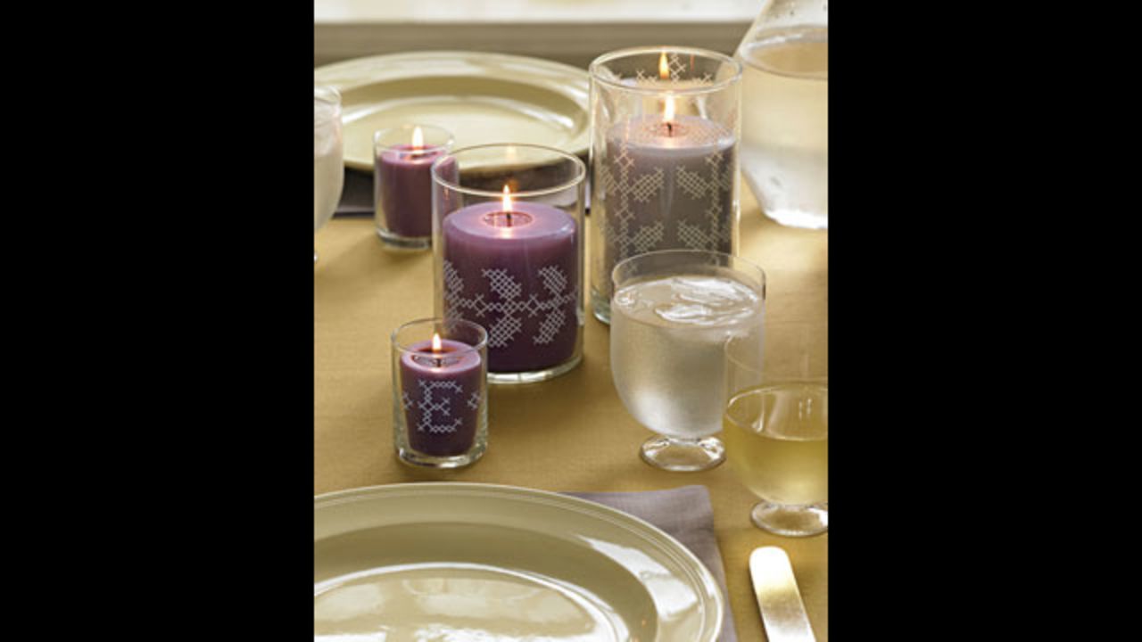 No-stitch cross-stitch: <a href="http://www.marthastewart.com/272383/no-stitch-cross-stitch?xsc=synd_cnn" target="_blank" target="_blank">Make your own</a> votive holders for this centerpiece.