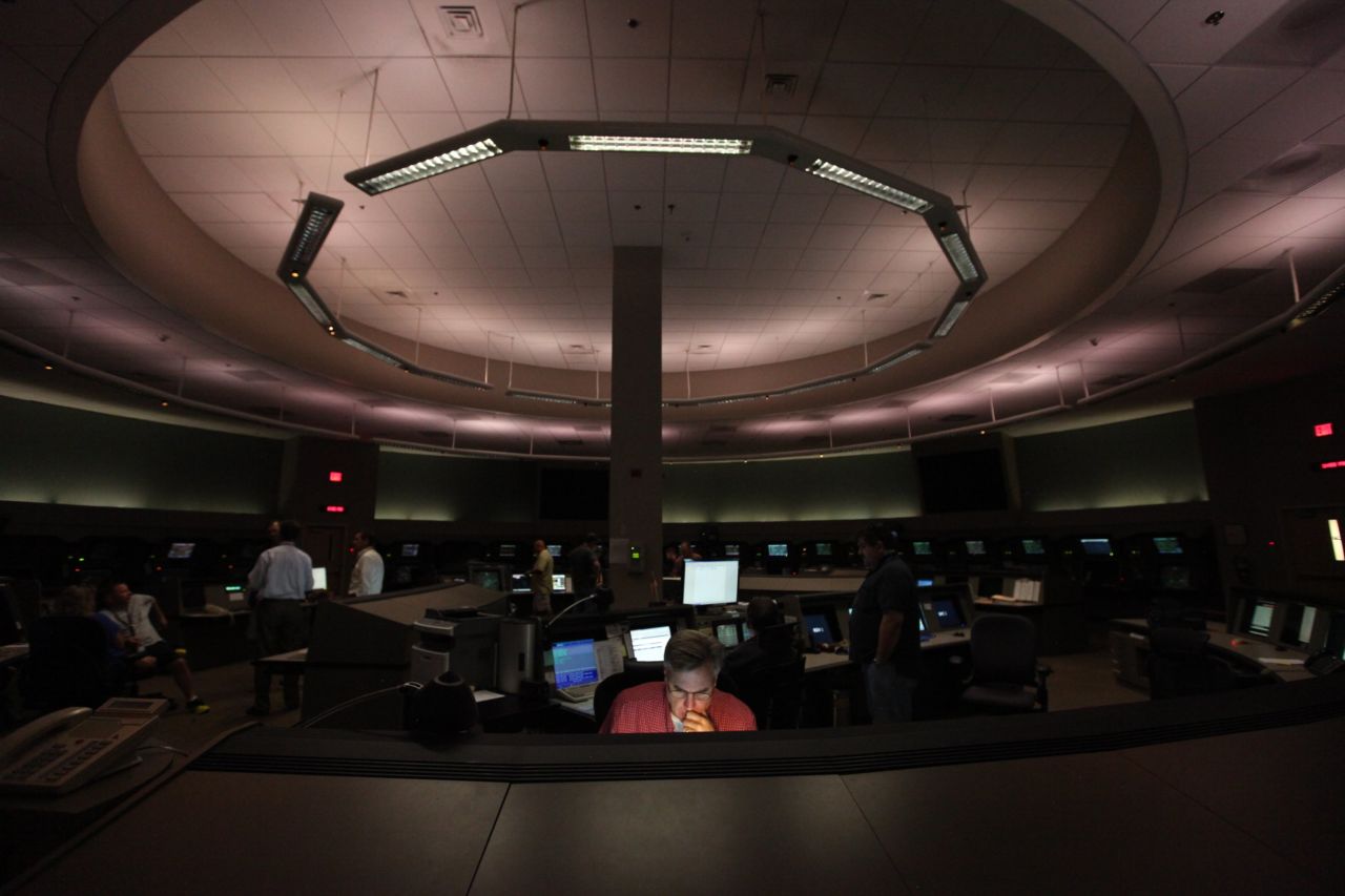 Inside the Federal Aviation Administration's Terminal Radar Approach Control, or TRACON, Ken Hunihan monitors the systems that air traffic controllers use, including radar antennas and communication towers.