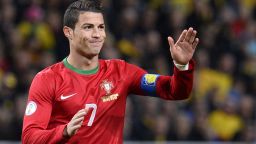 Portugal's forward Cristiano Ronaldo celebrates after scoring at the Friends Arena in Solna, near Stockholm on November 19, 2013 during the FIFA 2014 World Cup playoff football match Sweden vs Portugal. AFP PHOTO/ JONATHAN NACKSTRAND (Photo credit should read JONATHAN NACKSTRAND/AFP/Getty Images)